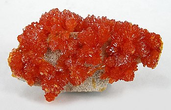 The mineral orpiment was a source of yellow and orange pigments in ancient Rome, though it contained arsenic and was highly toxic.