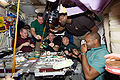 A dinner in space aboard the ISS during STS-129