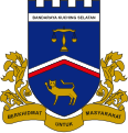 An example of canting arms outside Europe: the Malaysian city of Kuching features a cat on its municipal coat of arms, kuc(h)ing being the Malay word for cat