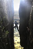 A climber doing the chimneying technique