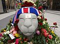 Tributes placed on one of the lions the week after the attack