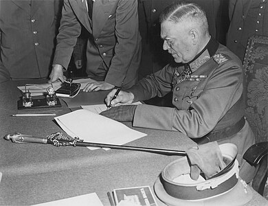 Wilhelm Keitel signs the German Instrument of Surrender, by Lt. Moore (restored by Adam Cuerden)