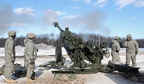 Soldiers of 1-119 FA conducting cold weather live-fire exercise.