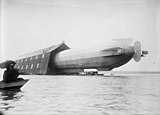 LZ 5 leaving the floating balloon hall before her first flight on Lake Constance, Germany in May 1909.