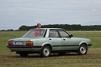 Ford Taunus TC3 4-door, highlighting the enlarged rear lights