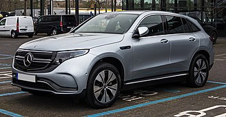 Dark photo of a silver crossover SUV