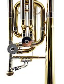 Bass trombone with two dependent rotary valves