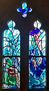 Window 1, Eve offering Adam the forbidden fruit