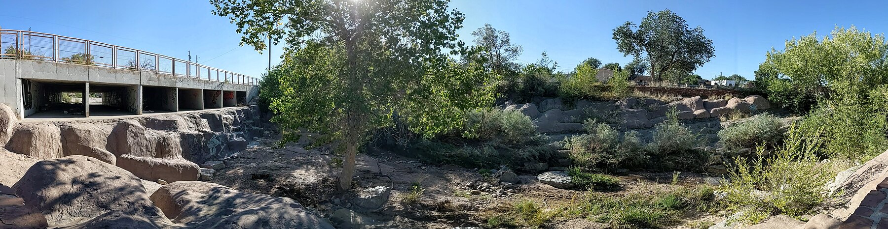 sandy area near concrete culvert