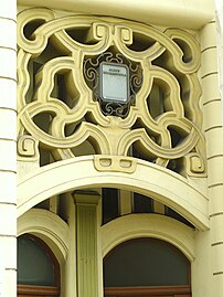 Art Nouveau ornamentation above the portal