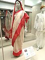 Image 50Red and cream Indian woman's saree, late 1990s (from 1990s in fashion)