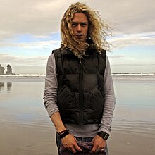 Phil Joel at Piha beach in New Zealand