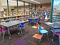 Young Adult books lining the shelves inside the Teen Lounge