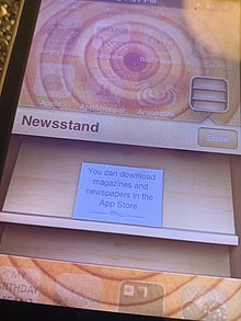 An empty Newssstand on iOS 6, inviting the user to download magazines and newspapers through the App Store
