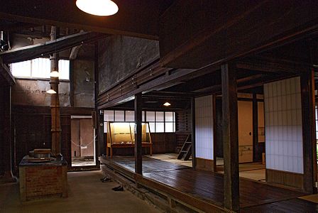 Shoji in a machiya (merchant's house). Light from full-height tōriniwa (通り庭, atrium/kitchen) enters the lateral tatami rooms.
