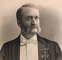 Crystal clear etching of Attorney William Andrew Sutherland in a tuxedo with a white bow tie, a pin representing his rank as a grand master among Masons.