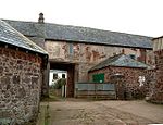 Linhay, barn and farm buildings adjoining on north-east side of foldyard at Bratton Court