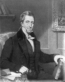 Image of a fair-skinned man, wearing early 19th century suit, sitting and holding a book