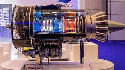 Honeywell/ITEC F124 jet trainer/light combat aircraft turbofan showing HP compressor with 4 axial and centrifugal last stage with high backsweep, splitter blades and leading edge sweep. Overall pressure ratio 19.4:1 from 3 axial fan, 4 axial HP and 1 centrifugal.