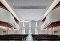 Historic church windows as seen from the interior of the new service hall, ca. 2019.