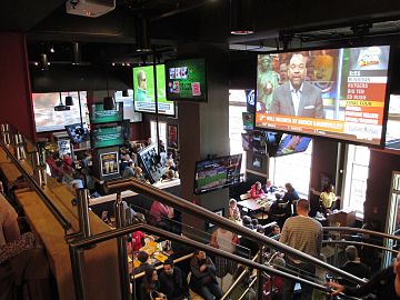 Interior of Buffalo Wild Wings in former hotel lobby, April 2013