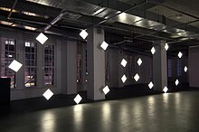 Lichtobjekt aus 18 LED Panels, zu einer liegenden Acht gruppiert, animiert