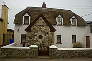 Thatched roof house in Kilmore Quay, Ireland