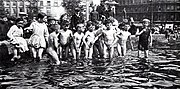 Trafalgar Square, c. 1912 boys and girls swimming