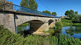 The bridge over the Ognon river in Vandelans