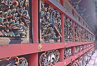 Brightly painted carvings at Yomeimon