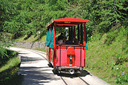 The tram car on the trail between station and hotel