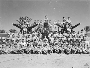 Members of 459 Squadron RAAF with one of the squadron's Martin Baltimore aircraft in the Western Desert of Libya, 1944