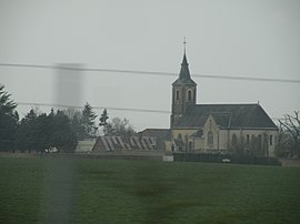 The church and surroundings in Blandainville
