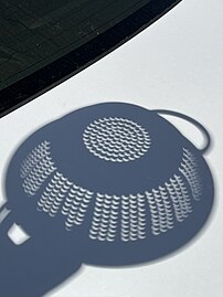 Colander projection of the eclipse in Corning, Arkansas