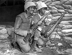 Ethiopian soldiers deployed with U.S.-made weapons in Korea, 1953. The M1 Carbine magazines are taped together.