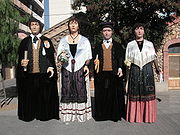 Gegants at Molins de Rei. The female figures are dressed as a pubilla.