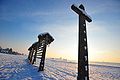 An abandoned single straight-line hayrack just outside Olševek in winter