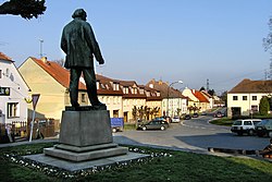 Statue of Mikoláš Aleš on the town square