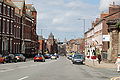 Liverpool's inner city has Georgian terraced streets. Wellington Rooms to the right, Royal Liver Building in the distance