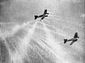 Gun camera photo of tracer ammunition fired from a Royal Air Force Supermarine Spitfire striking a Luftwaffe Heinkel He 111 during the Battle of Britain of World War II