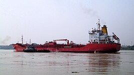 A Ship in the Hooghly River, the approache channel of the Port of Kolkata
