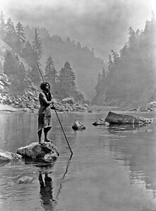 Hupa fisherman, by Edward S. Curtis