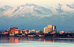 Downtown Anchorage and Bootleggers Cove as photographed from Point Woronzof Park on an April evening.