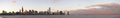 3. A panoramic view of the city at sunset.