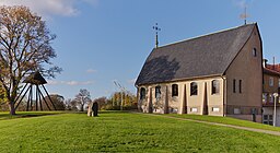 Flämslätts kyrka med klockstapel med två klockor.