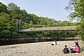 An old suspension bridge over the River Wharfe in Ilkley.