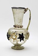 11th or 12th-century jug, blown, trail-decorated and tooled, 18.2 cm tall
