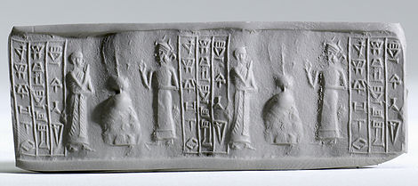 Impression of cylinder seal (Walters 42699), showing bad sign in line no. 1, 3rd sign. (reads from top-down-to-bottom)