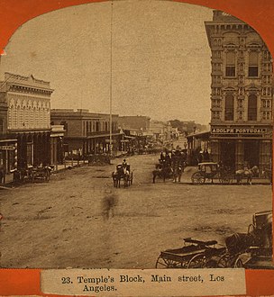 Looking south on Main St. towards Temple Block with Adolph Portugal dry goods store, mid-1870s