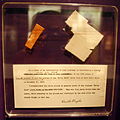 Wright Flyer wood, fabric, and a note by Orville Wright taken aboard Space Shuttle Challenger's 1986 flight STS-51-L, which exploded soon after liftoff